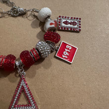 Load image into Gallery viewer, Delta Sigma Theta charm bracelet.