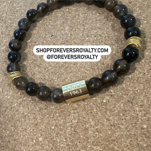 Iota brown bracelet .