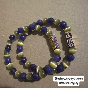 The purple and yellow Omega Psi Phi bracelet.