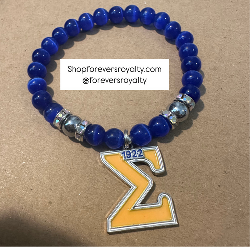 The yellow Sigma bracelet.