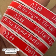 Load image into Gallery viewer, Red and white Delta wristband