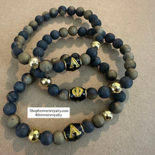Load image into Gallery viewer, Black and gold A Phi A bracelet.
