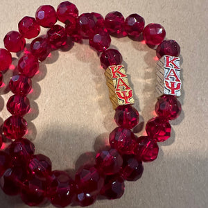 Red silver or gold bracelet.