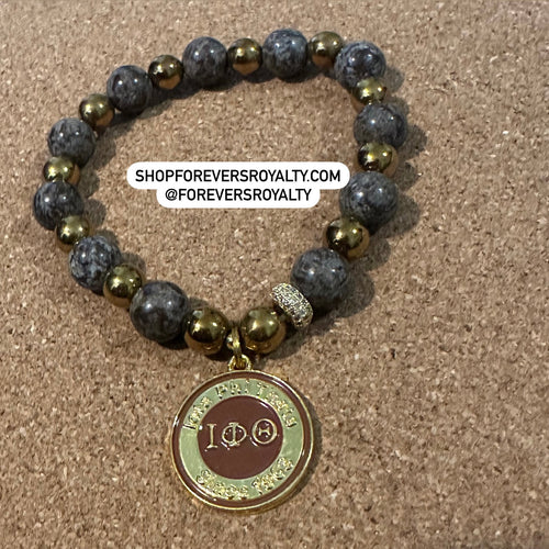 Brown and gold Iota bracelet.