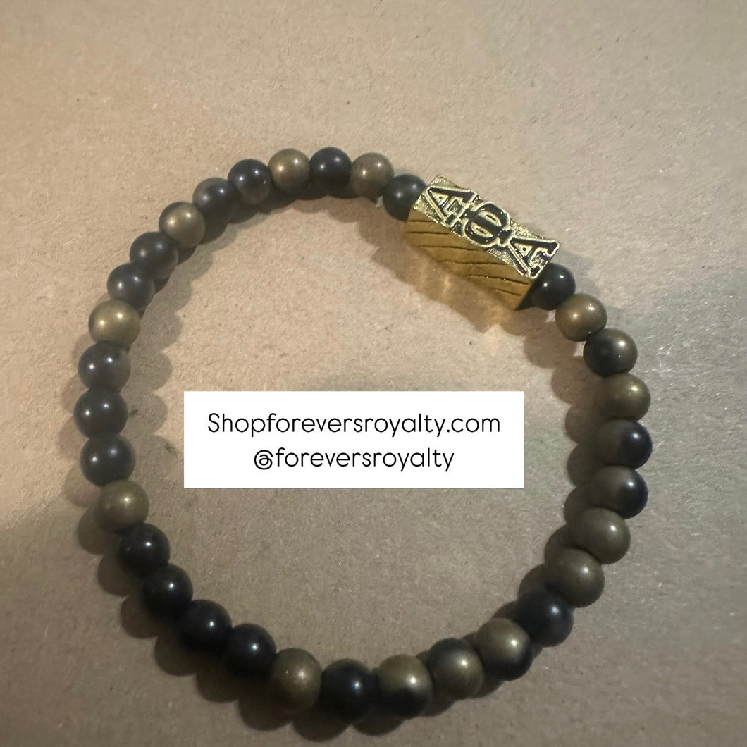 Mini Black and Gold Alpha Phi Alpha bracelet.