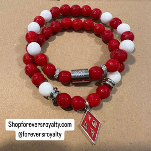 Red Kappa Alpha Psi bracelets.