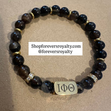 Load image into Gallery viewer, Gold Iota Phi Theta bracelet.