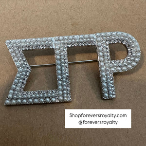 Silver Sigma Gamma Rho pin.
