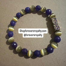 Load image into Gallery viewer, The purple and yellow Omega Psi Phi bracelet.