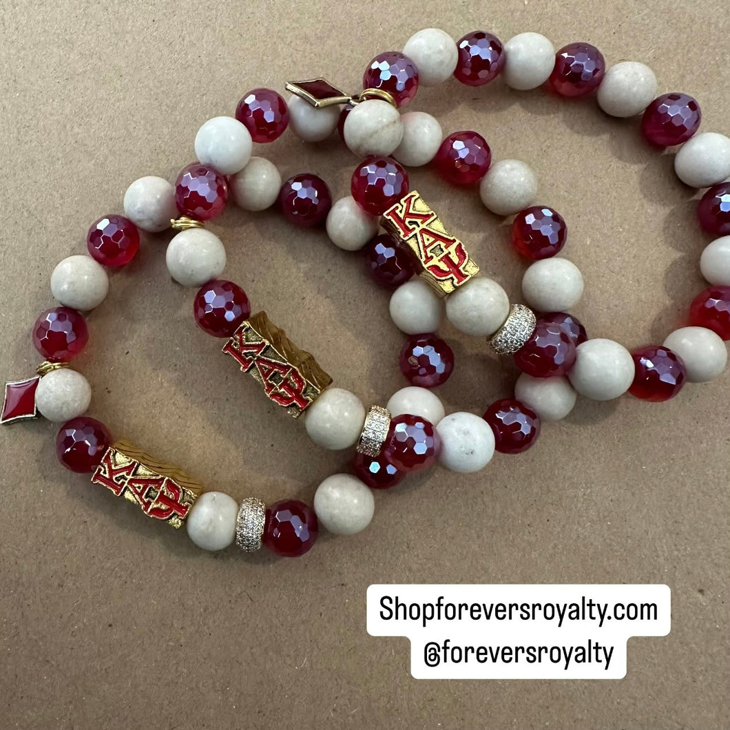 Red and gold Kappa Alpha Psi bracelet.