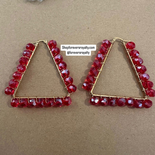 Red pyramid earrings.