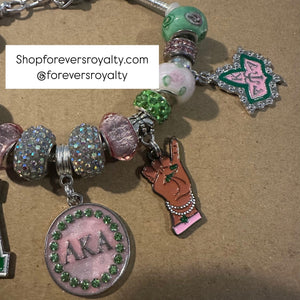 Silver and green AKA charm bracelet