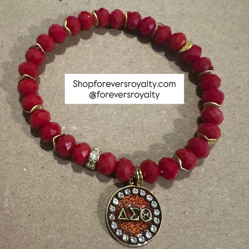 Red circle D bracelet.