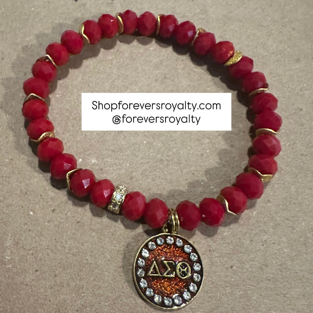 Red circle D bracelet.