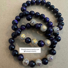 Load image into Gallery viewer, 1 Tigers eye Omega Psi Phi bracelet.