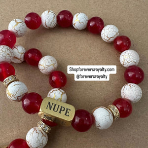 The gold Nupe bracelet.