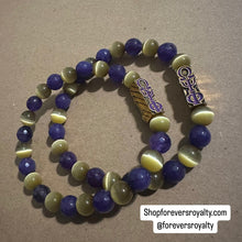 Load image into Gallery viewer, The purple and yellow Omega Psi Phi bracelet.