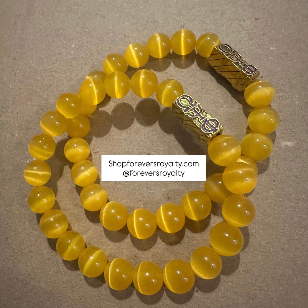 All yellow Omega Psi Phi bracelet.