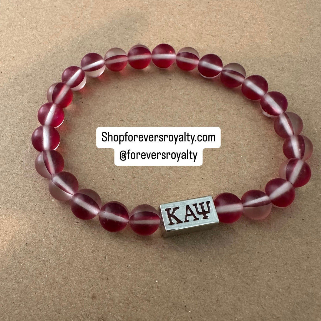 The red Kappa bracelet.