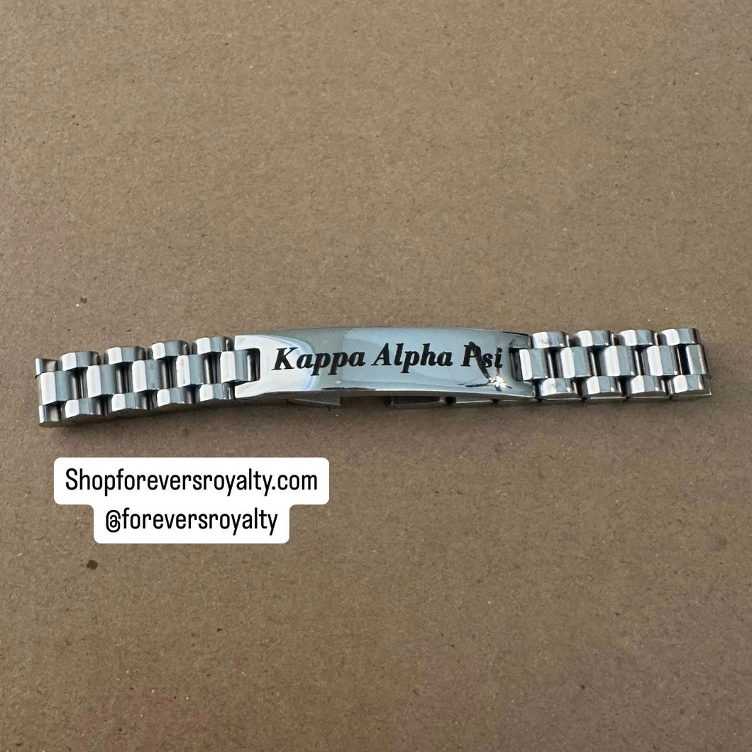 Silver Kappa Alpha Psi chain bracelet.