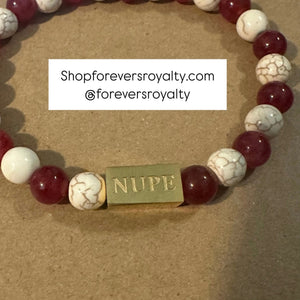 The gold NUPE bracelet